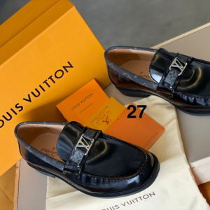 Louis Vuitton Loafers with Silver-Tone LV Logo in Black